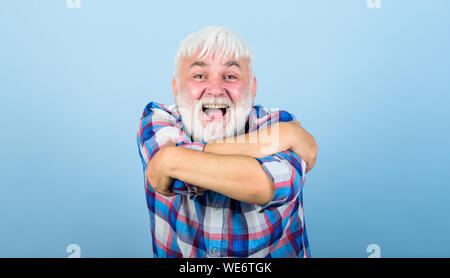 Be yourself. senior man with gray beard. barber and hairdresser. male fashion. mature bearded man in white wig. Hairloss concept. health care. happy old granpa. grandfather on retirement. Stock Photo