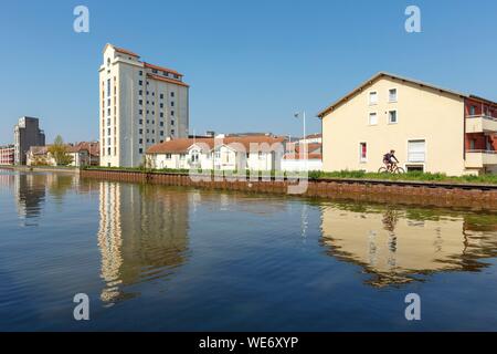 France, Meurthe et Moselle, Nancy, former grain silos (1941-1942) now apartment buildings on the Meurthe canal Stock Photo