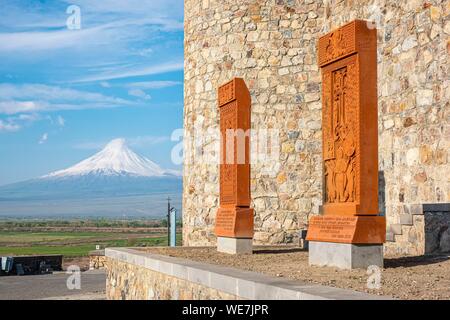 Armenia, Ararat region, khatchkar (memorial stele) in Khor Virap monastery and Mount Ararat Stock Photo