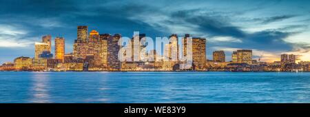 United States, New England, Massachusetts, Boston, city skyline from Boston Harbor, dusk Stock Photo