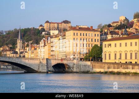 France, Rhone, Lyon, historic district listed as a UNESCO World Heritage site, Old Lyon, Quai Fulchiron, Bonaparte bridge over the Saone river and Saint Georges church, Saint-Just College on Fourviere hill in the background Stock Photo