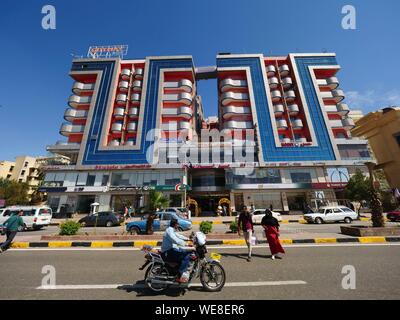 Egypt, Upper Egypt, Nubia, Nile Valley, Aswan, Modern hotel in downtown Aswan on the banks of the Nile Stock Photo