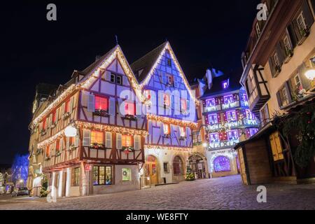 France, Haut Rhin, Alsace Wine Route, Colmar, Christmas lights on rue des Marchands Stock Photo