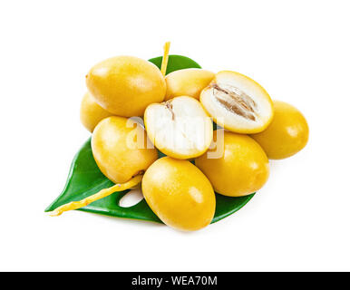 A bunch of fresh date palm fruits Isolated on white background. Stock Photo