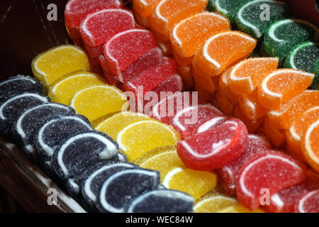 Colorful lollipops and different colored round candy. Stock Photo