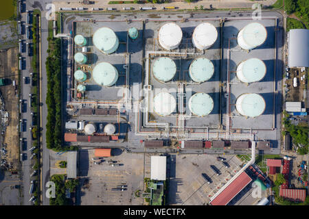Aerial view of Chemical industry storage tank and tanker truck In wailting in Industrial Plant to tranfer oil to gas station.