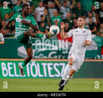 BUDAPEST, HUNGARY - AUGUST 29: (l-r) Tokmac Chol Nguen of Ferencvarosi TC  celebrates his goal in front of Gergo Lovrencsics of Ferencvarosi TC during  the UEFA Europa League Play-off Second Leg match