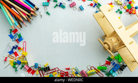 Back to school background with School supplies on white paper background ready for your design and copy space for your text. Stock Photo