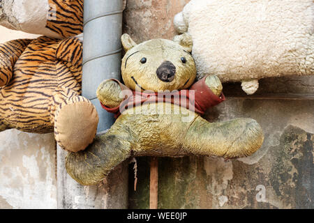 Vintage Stuff bear in Collection of abandoned stuffed animals in the Yard of Lost Toys, in Lviv Ukraine Stock Photo
