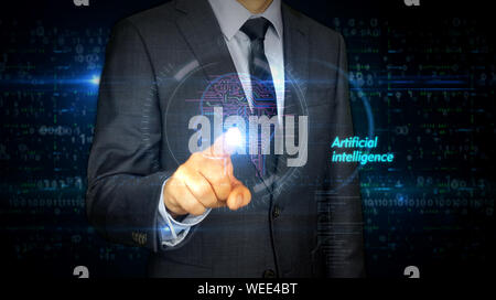 A businessman in a suit touch the screen with artificial intelligence hologram. Man using hand on virtual display interface. Cybernetic brain, deep le Stock Photo