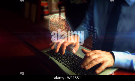 Artificial intelligence concept with man and laptop Stock Photo - Alamy