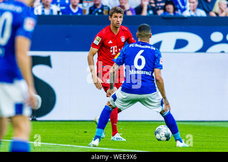 24 augustus 2019 Gelsenkirchen, Germany Soccer Schalke 04 v Bayern Munchen   24-08-2019: Voetbal: Schalke 04 v Bayer Munchen: Gelsenkirchen L-R FC Bayern Munchen player Thomas Muller Stock Photo