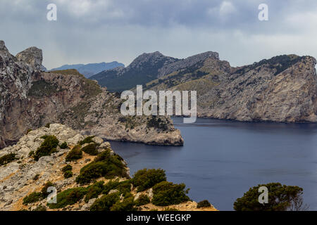 Scenic view on the coast at bay Cap de Formentor on balearic island Mallorca, Spain on a sunny day with clear blue water an rocky coastline Stock Photo