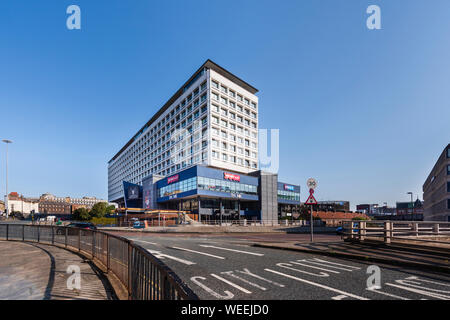 55 Degrees North commercial & apartment block formerly Swan House  stands on a roundabout and over the Central Motorway A167  in Newcastle upon Tyne Stock Photo