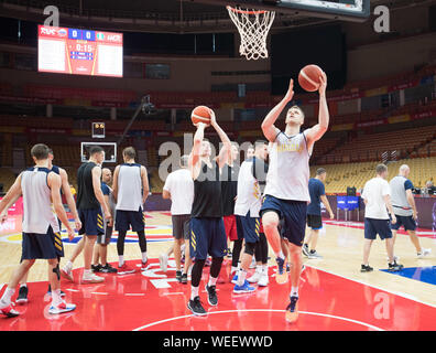 Wuhan, China's Hubei Province. 30th Mar, 2024. A staff member takes ...