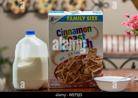 Cinnamon toast crunch cereal with milk and bowl Stock Photo