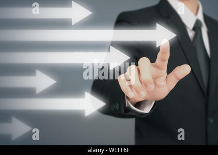 Businessman Hand Touching stock Graph Indicating Growth Stock Photo