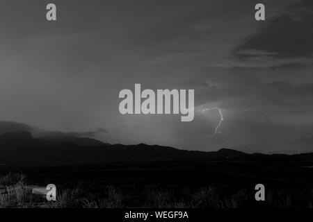 Lightning storm at night Stock Photo