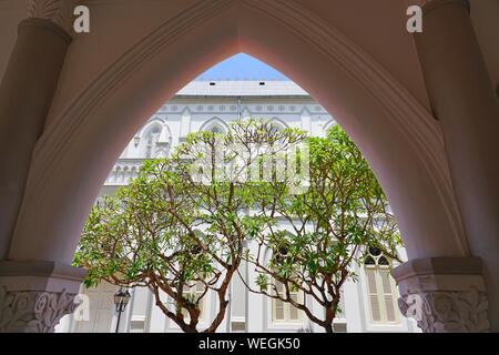 SINGAPORE -23 AUG 2019- View of landmark colonial style Raffles Hotel, a famous luxury hotel in the Civic District in Singapore opened in 1887 and reo Stock Photo