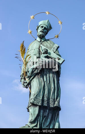 Czech Saints, Saint Nepomuk, statue on Charles Bridge Prague Czech Republic Europe Stock Photo