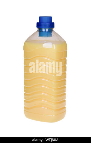 Bottle with yellow fabric softener isolated on white background. Stock Photo