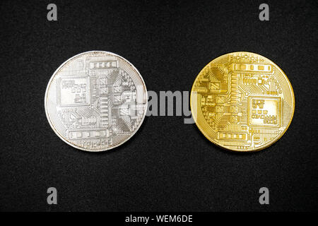 physical version of bitcoin that is a new virtual money world cryptocurrency and digital payment system by using blockchain technology Stock Photo