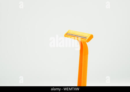Shaving razor blades for men or women in yellow color, the object is ...