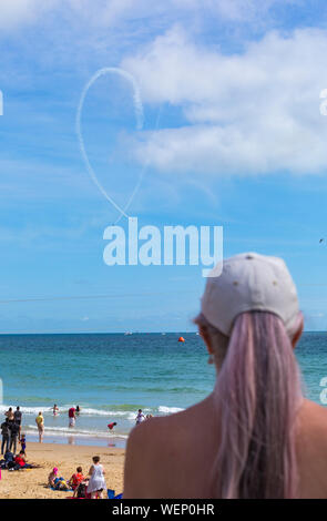 Bournemouth, UK. 30th August 2019. The Blades Aerobatic Display Team leave a heart message to beachgoers, as crowds flock to see Bournemouth Air Festival. Credit: Carolyn Jenkins/Alamy Live News Stock Photo