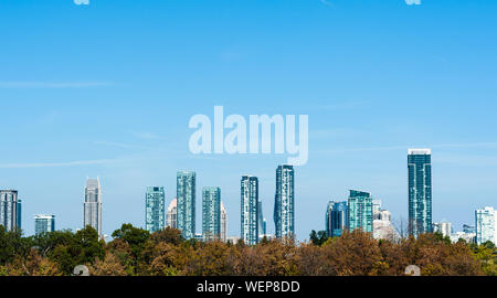 MISSISSAUGA, ONTARIO, CANADA - OCTOBER 01, 2017: Modern residential condo towers fill the skyline in the increasingly dense downtown area. Stock Photo