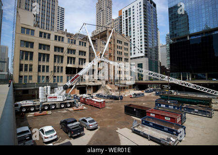 tadano all terrain af 400g-6 large crane working on construction site for condominiums at  tribune tower chicago illinois united states of america Stock Photo