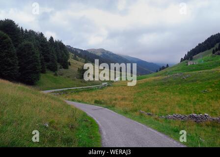 Mount Grappa, Veneto,Italy. The winding road that crosses Val delle Mure plateau. Stock Photo