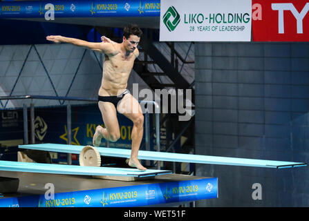 KYIV, UKRAINE - AUGUST 9, 2019: Patrick HAUSDING of Germany performs during Mens 3m Springboard Final of the 2019 European Diving Championship in Kyiv, Ukraine Stock Photo