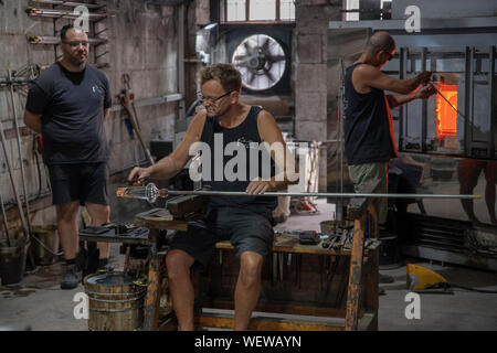 Glass blowers at work in Gibraltar Stock Photo