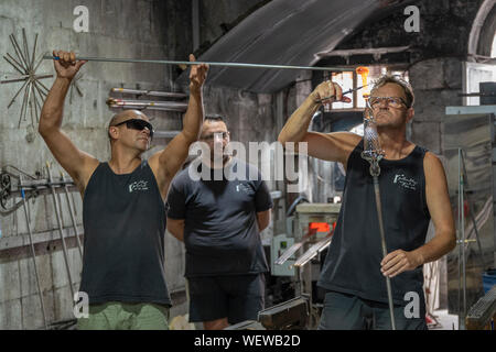 Glass blowers at work in Gibraltar. Stock Photo