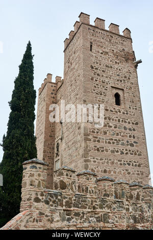 TOLEDO, SPAIN - APRIL 24, 2018: Tower at the Alcantara Bridge in Toledo. Stock Photo