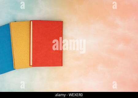 Colorful books for reading on the table Stock Photo
