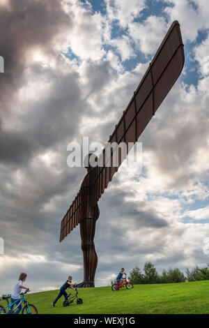 The Angel of the North is a contemporary steel sculpture located on a hill at Low Eighton in Gateshead, Tyne and Wear. It was designed by Antony Gorml Stock Photo