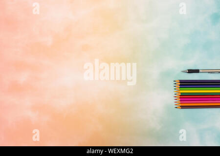 Colored pencils on the table for art work Stock Photo