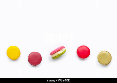 Colorful macarons isolated on white background. Stock Photo