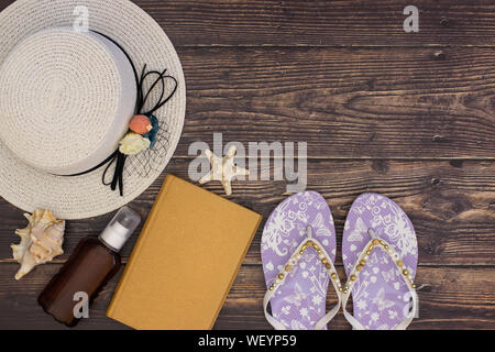 Summer kit and beach accessories on wooden background Stock Photo