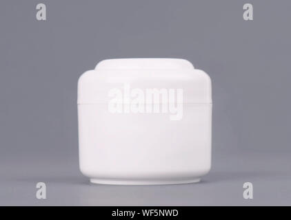 White cosmetic cream container. Mock up bottle. Gel, powder, balsam, without design label. Containers for bulk mixtures Stock Photo