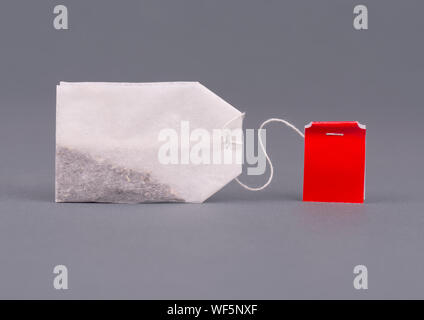 Close-up tea bag on grey background mock up. Stock Photo