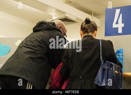 Wethersfield, CT / USA - June 11, 2019: A couple consults a customer service agent at the fourth booth Stock Photo