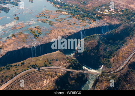 Spectacular Aerial of Victoria Falls Waterfall and Bridge across the Zambezi, Zimbabwe, Africa Stock Photo