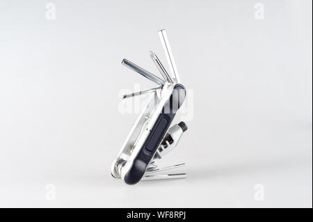 Bicycle multi-function tool with integrated chain tool and tyre levers Stock Photo