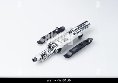 Bicycle multi-function tool with integrated chain tool and tyre levers Stock Photo