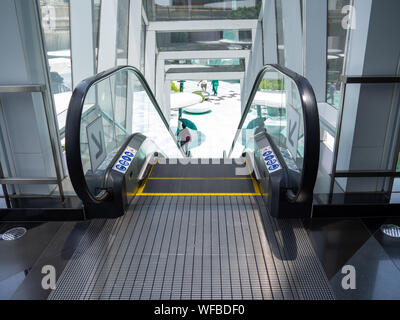Escalator electronic system moving filter, Escalator in Community Mall, Shopping Center Stock Photo