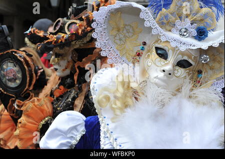 Close-up Portrait Of Person Wearing Mask During Carnival
