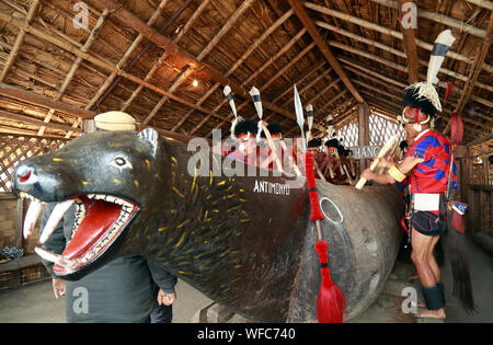 Chang Tribe Beating Tribal Drum, Hornbill festival, Nagaland, India Stock Photo