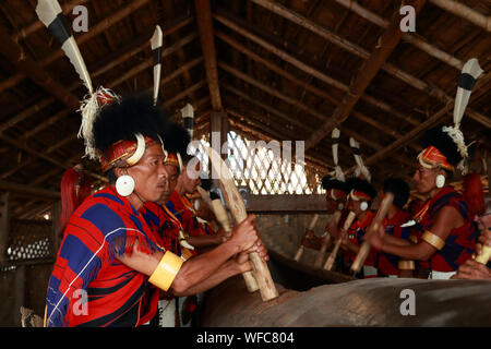 Chang Tribe Beating Tribal Drum, Hornbill festival, Nagaland, India Stock Photo